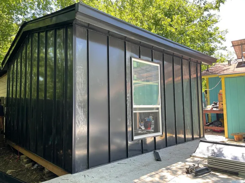 Black standing seam metal wall panels for Roof Inspection in Newington