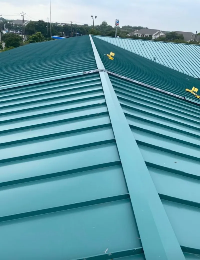 Green commercial metal roof ridge and valley for Metal Roof Repair in Newington